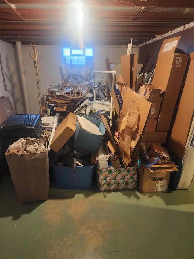 Roll-off dumpster container at job site for 2 Yard Dumpster Rental in Ruidoso